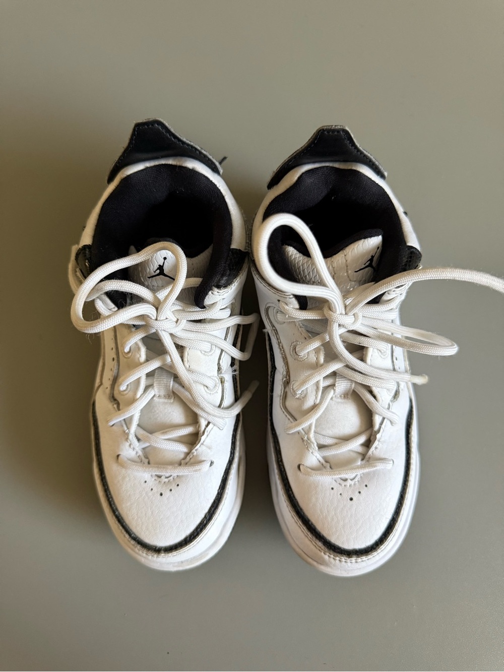Jordan Kids' White and Black High-Top Sneakers
Kids shoes size 12c